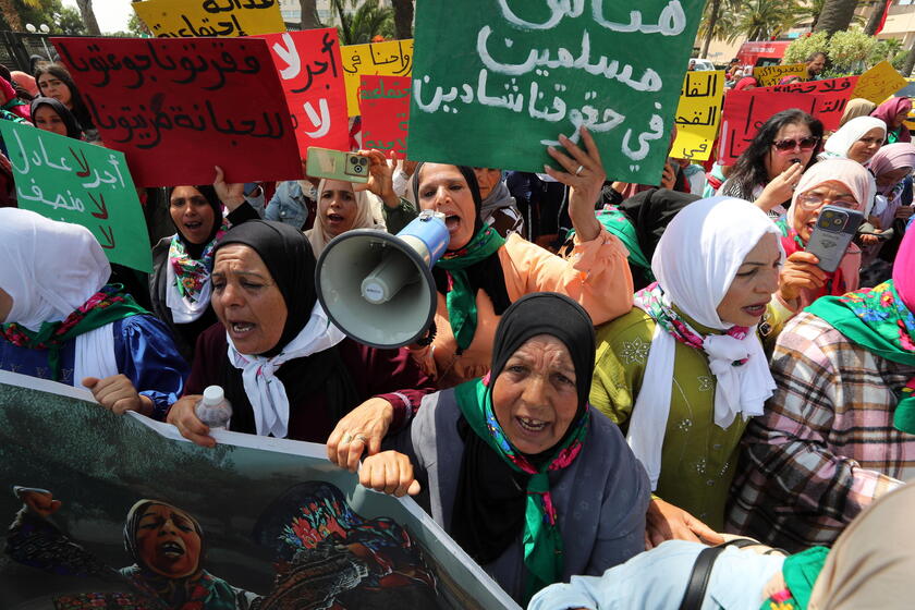Women agricultural workers march to demand more rights and improved working conditions